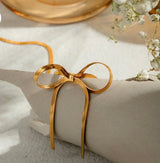 Sleek Snake Bow Necklace